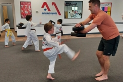 Cardio drills are frequently a mixture of kicks and punches, with a few squats and push-ups thrown in for good measure! 