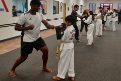 KFMA parents really enjoyed getting to strike the targets while their kids were holding! 