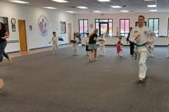 Parents enjoying a good workout with their KFMA Tigers!
