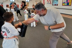 A father having a fun time working on drills with his Tiger son! 