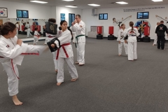 Teen girls training together during a KFMA Family class! 
