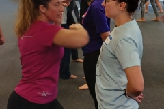 KFMA-womens-self-defense-elbow-strikes-image-train-partner