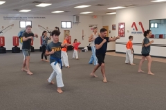 Parents working on some basic combinations during the warm-up! Parents working on some basic combinations during the warm-up!