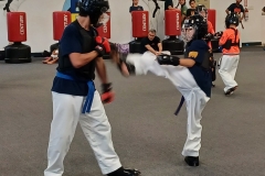 Color belt kids working on drills during a KFMA basic sparring clinic. Color belt kids working on drills during a KFMA basic sparring clinic.