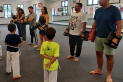 Parents working with their kids in Tiger class.