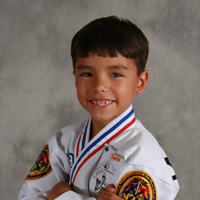 karate kid with arms crossed
