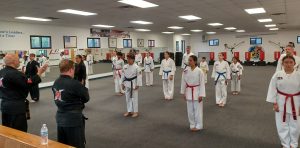 At the start of each family martial arts class at KFMA, students line-up according to rank for the traditional bow-in.