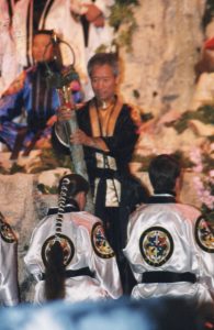 Chief Master Laura Kowkabany being dubbed as a new Master by Eternal Grand Master Haeng Ung Lee in 1999.